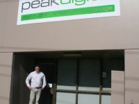 Andrew in front of new building