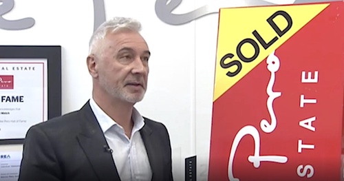 Mike Pero with one of his aluminium signs