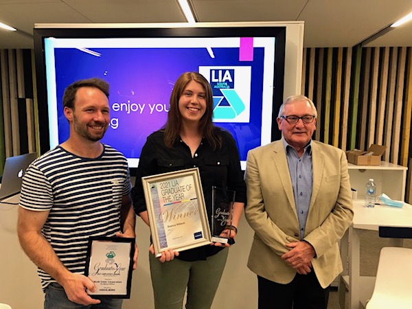Winner Bianca Wilson centre with employer Rob Slater from Multi Color Corporation left and Peter Harper CEO of Visual Connections