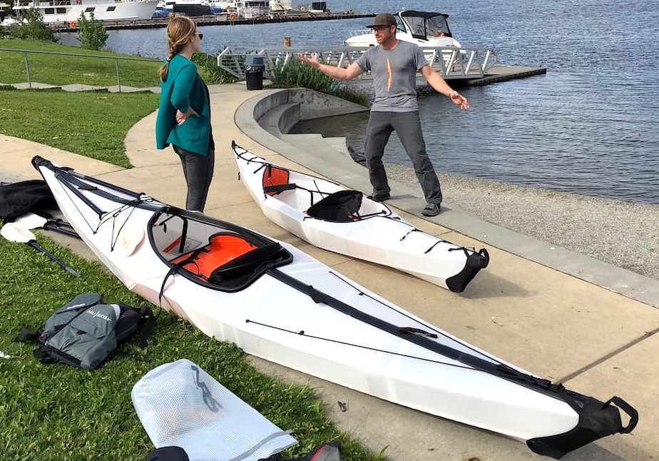 ORU Setting up 2 Oru Kayaks on Lake Union shore
