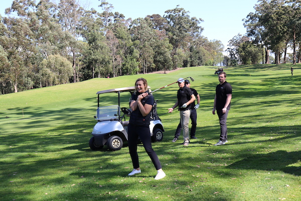 Starleaton Ines Eaton admires her shot while Wayne Horton Ben Eaton and Clayton Schneider look on
