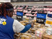 Walmart associate scanning products tagged with Avery Dennison RFID enabled labelsjpg