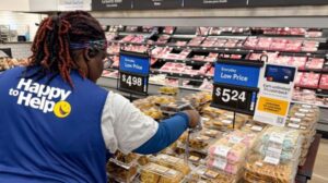 Walmart associate scanning products tagged with Avery Dennison RFID enabled labelsjpg